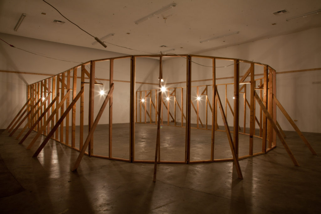 Lauren Davis Fisher, “New Structures, New Orientations” (2013 Dimensional lumber, cable, lights. Dimensions variable). Photograph by Cameron Crone.